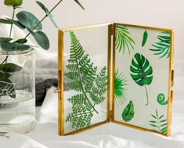 Frame filled with beautifully pressed leaves.