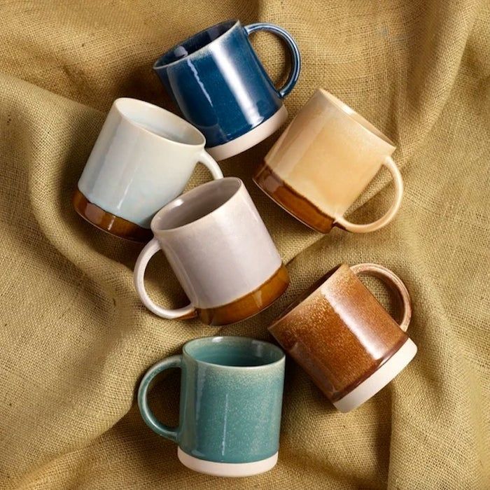 a set of six colorful mugs