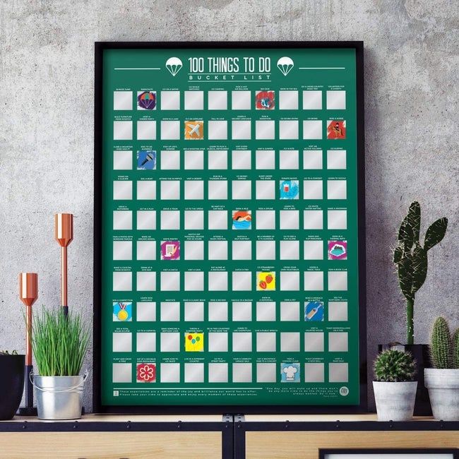 The board displays several scratched-off squares, revealing charming images underneath.