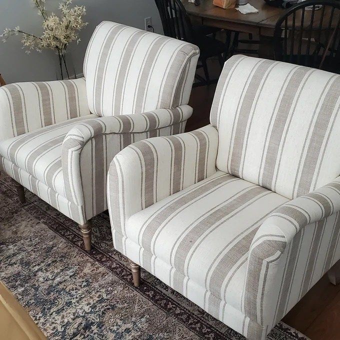 two gray and white striped chairs