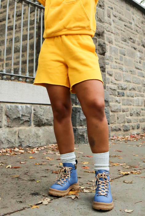 A model showcasing the boots in indigo.