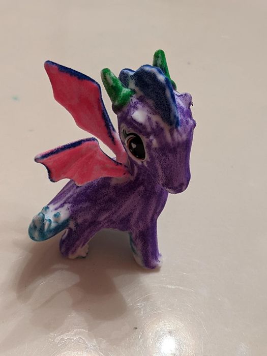 A dragon that has been carefully colored in