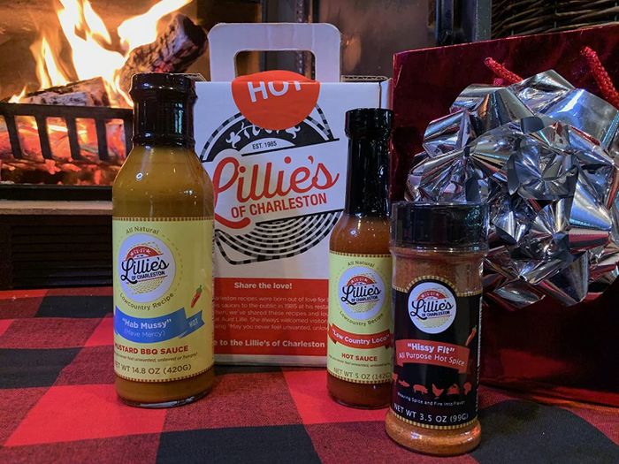 A gift box from Lillie’s of Charleston, containing their signature hot sauce, mustard BBQ sauce, and spice dry rub.