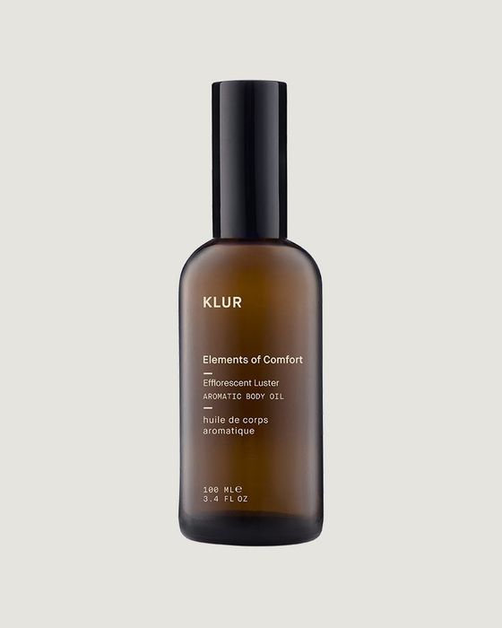 A brown bottle of Klur body oil.