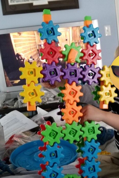 A child assembling with the gears