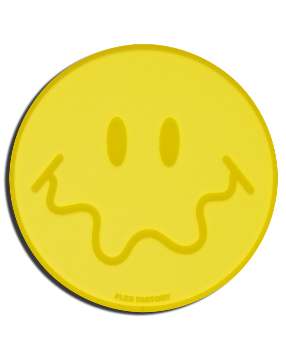 A yellow smiley face coaster featuring a fun, squiggly smile.