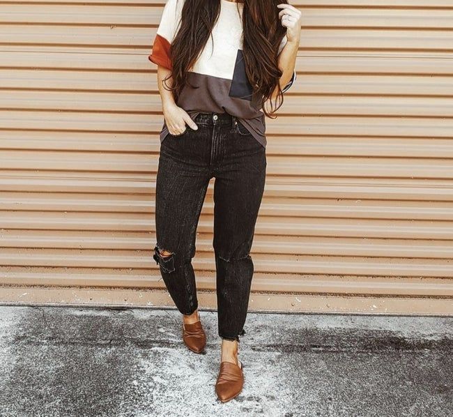 Dark tan slip-on mules.