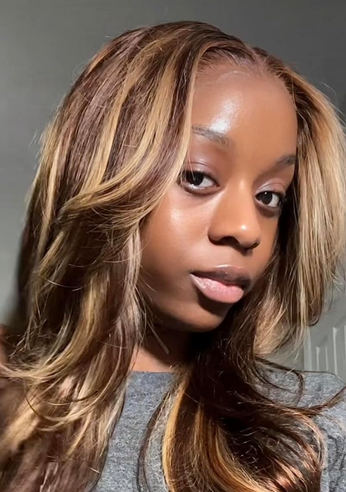 A reviewer showing off their glowing, radiant skin.