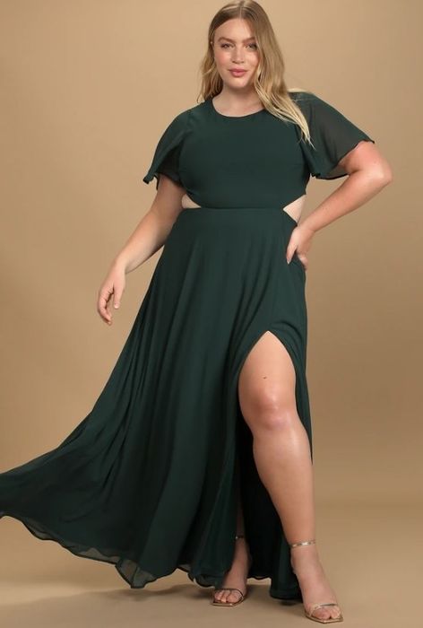 An image of a model showcasing a cutout maxi dress in a striking design