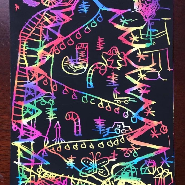 A snapshot shared by a reviewer showing their child's rainbow artwork.