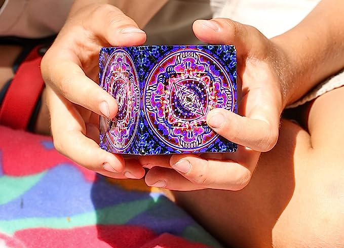 Hands manipulating the puzzle cube, creating various shapes.