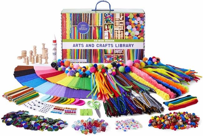 The contents of the arts and crafts kit displayed in front of its box
