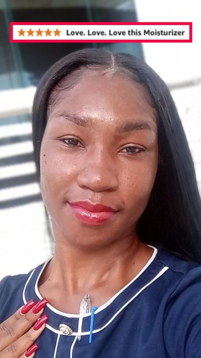 A reviewer showing their hydrated, glowing skin