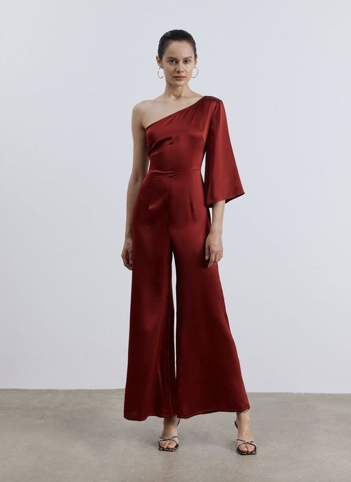The model is dressed in an elegant gown.