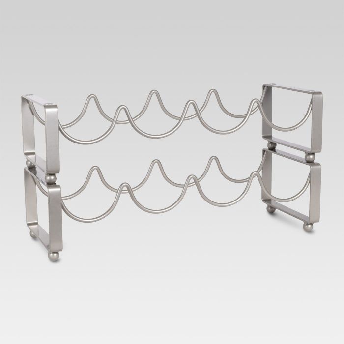 A sleek silver wine rack to keep your bottles organized and stylish.