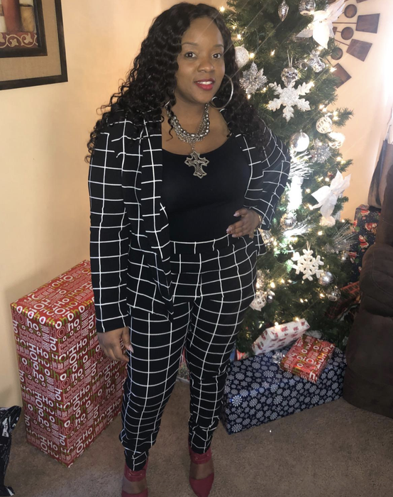 A reviewer in the black and white two-piece set