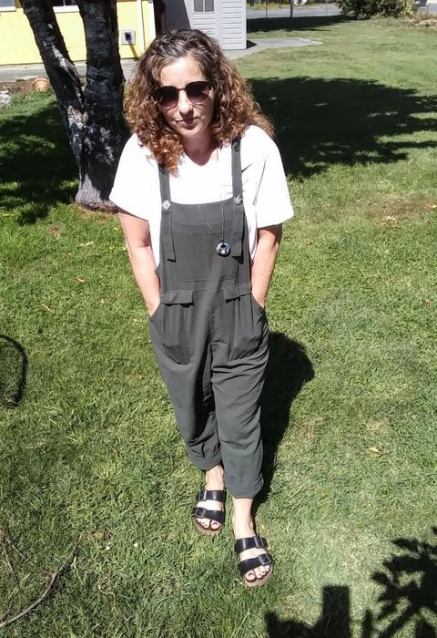 a reviewer rocking the overalls in green