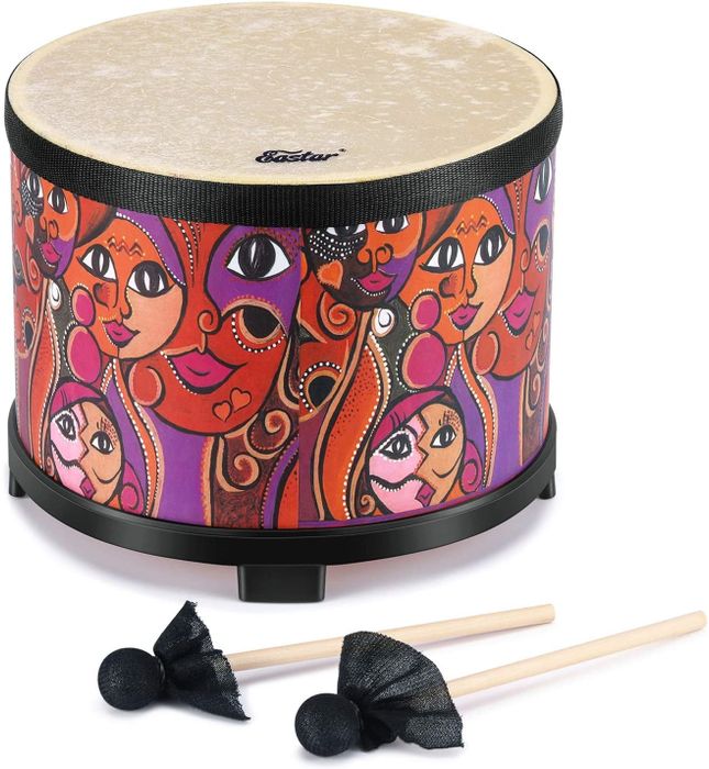 A child’s drum accompanied by two drumsticks