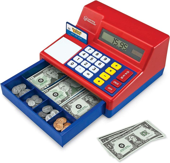 A play cash register complete with toy money for imaginative role play.
