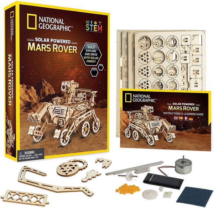 A wooden model kit of a Mars rover for building and exploration.