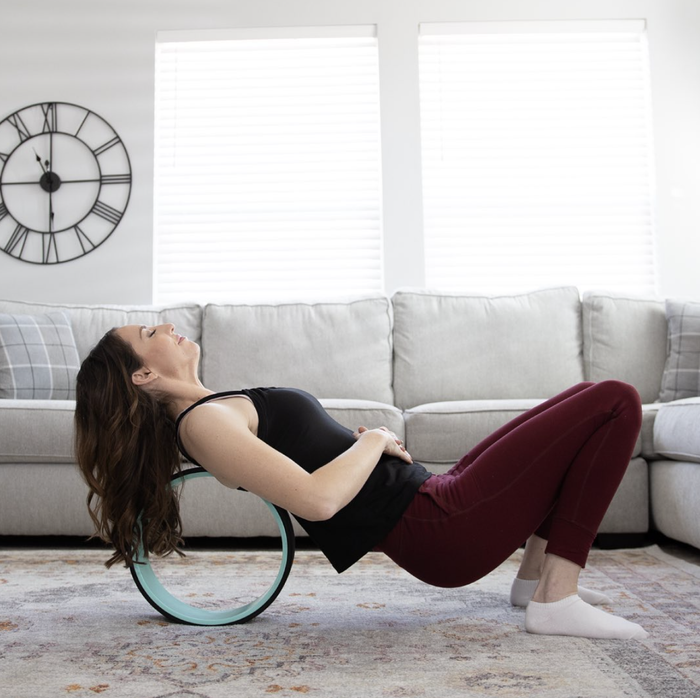 A model demonstrating the use of a large wheel to relieve back tension.