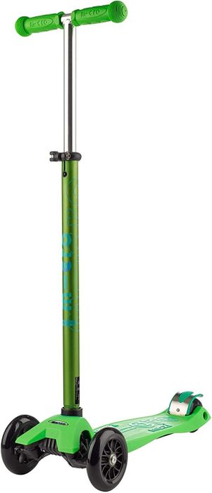 A kid-sized green scooter