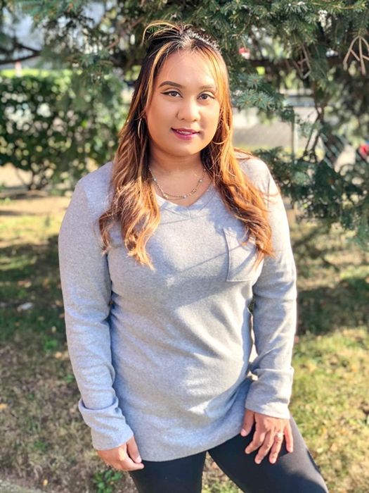 a customer rocking the shirt in gray