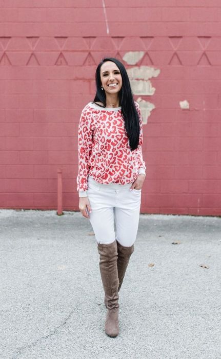 Another reviewer sporting the sweatshirt in a trendy pink leopard print.
