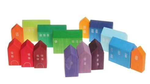 A set of brightly colored blocks resembling tiny houses