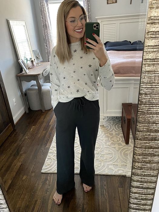 a reviewer wearing the pants in black