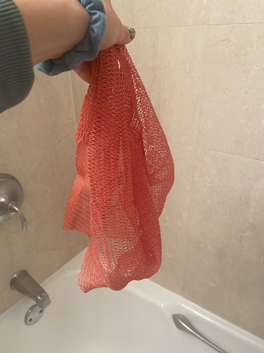 Mytour editor showcasing the mesh fabric scrub in a vibrant coral color