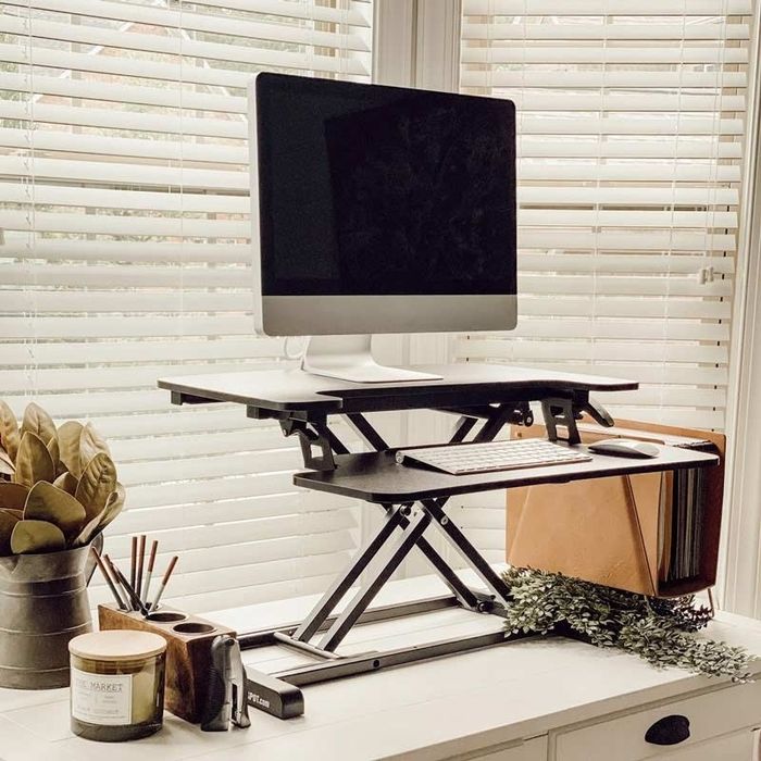 The standing desk converter in action.