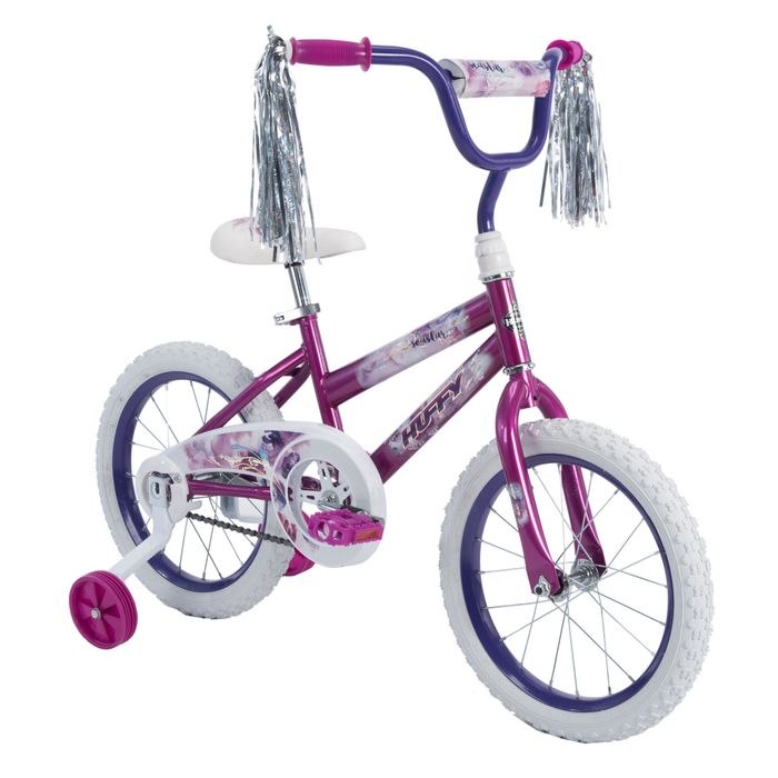 A pink and purple bicycle, featuring training wheels and colorful tassels.