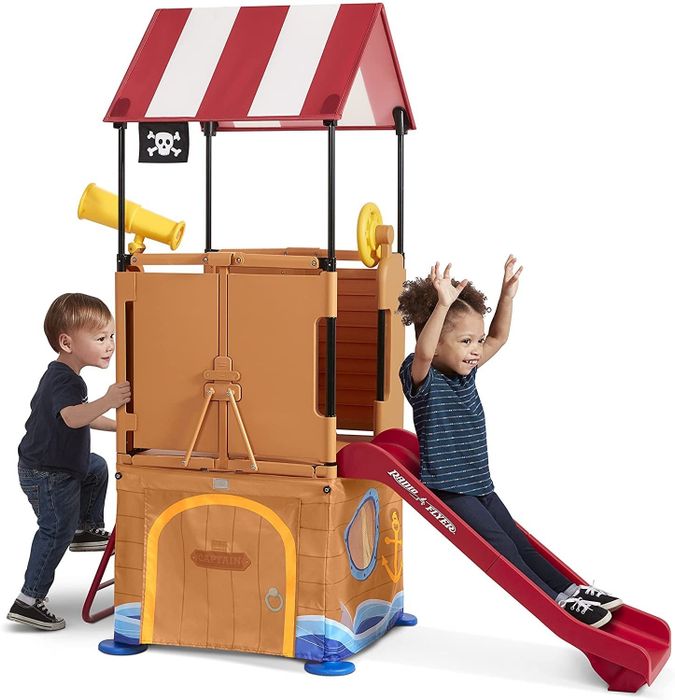 the pirate-themed play set complete with a slide and telescope