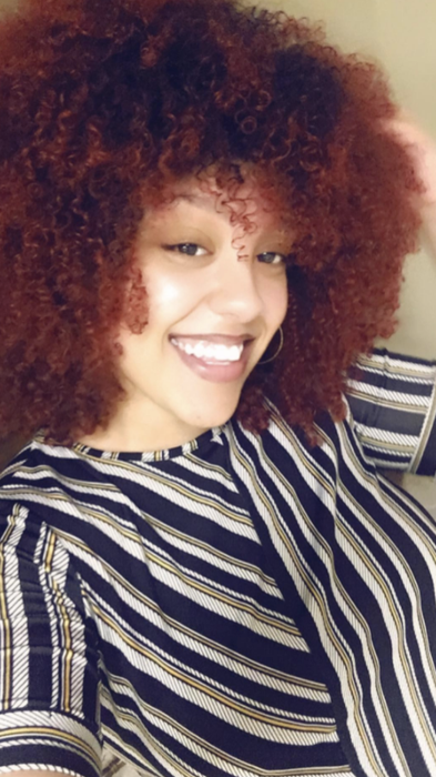 Reviewer with 3c natural hair looking hydrated and healthy