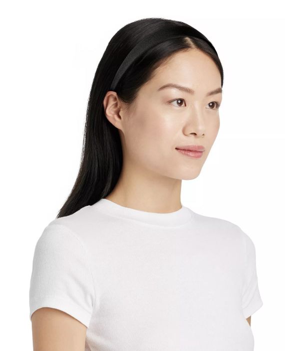 A person sporting a black headband