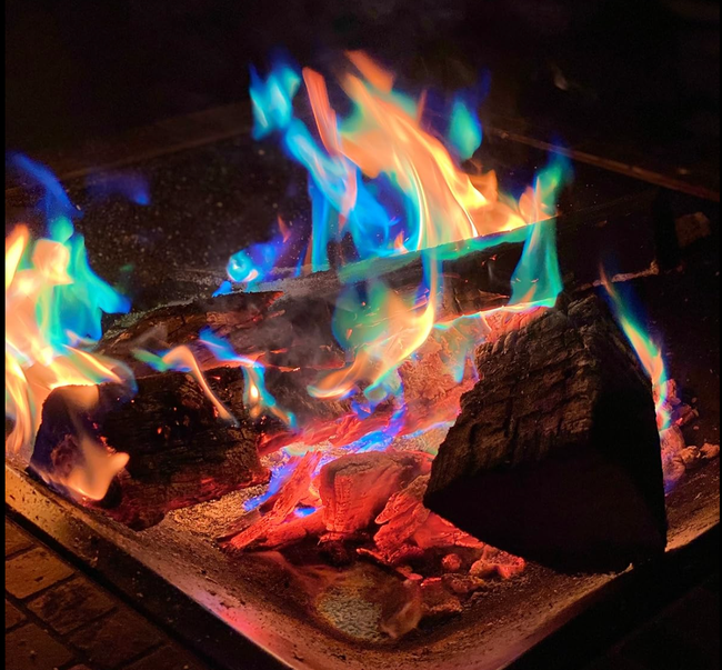 A photo from a reviewer showing the vibrant, colorful flames from the fire.