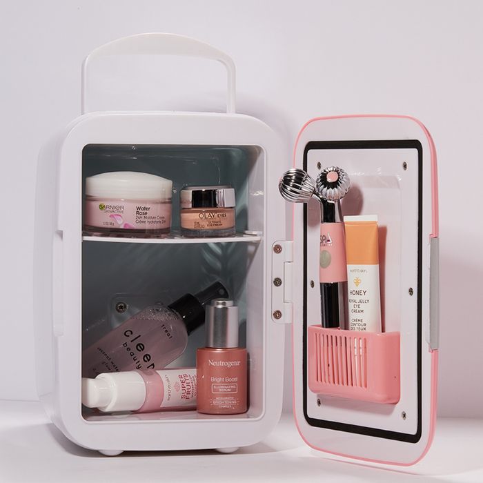 the interior of the fridge stocked with skincare products