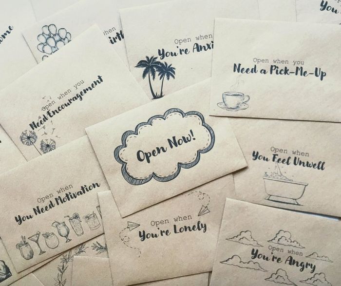 Brown paper cards with messages like