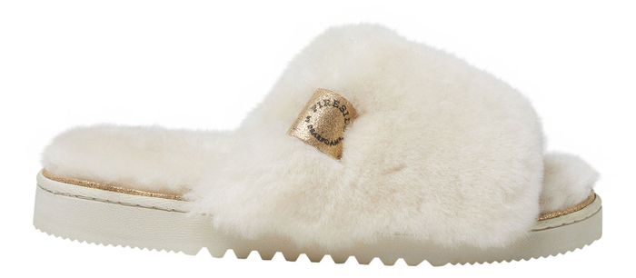 The slippers in white, with a soft white fur lining.