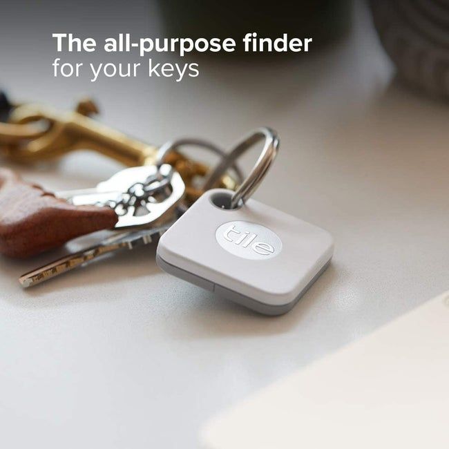 The small white square tracker attached to a keychain.