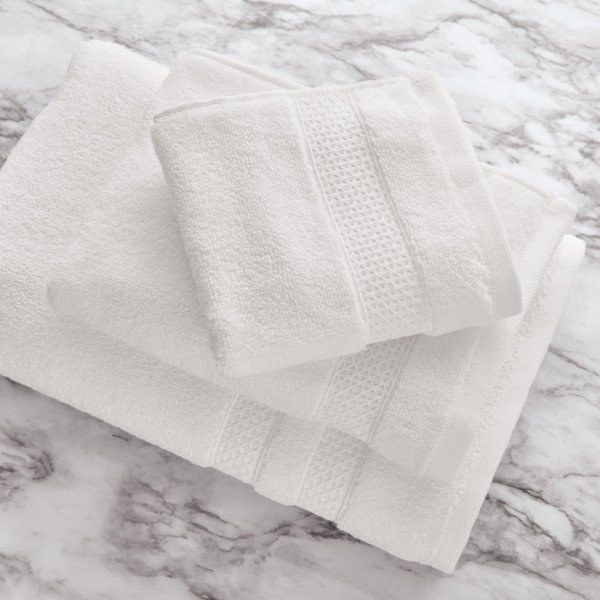 The towel set in pristine white.