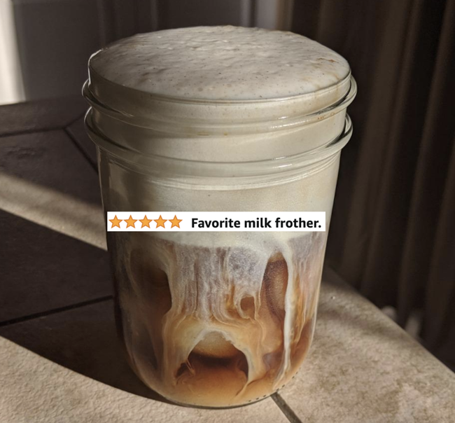 a mason jar holding the reviewer's coffee accompanied by text