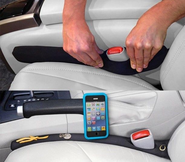 A person is installing a car seat gap filler, with the filler catching a phone, earring, French fry, and coins from the deep gap below.