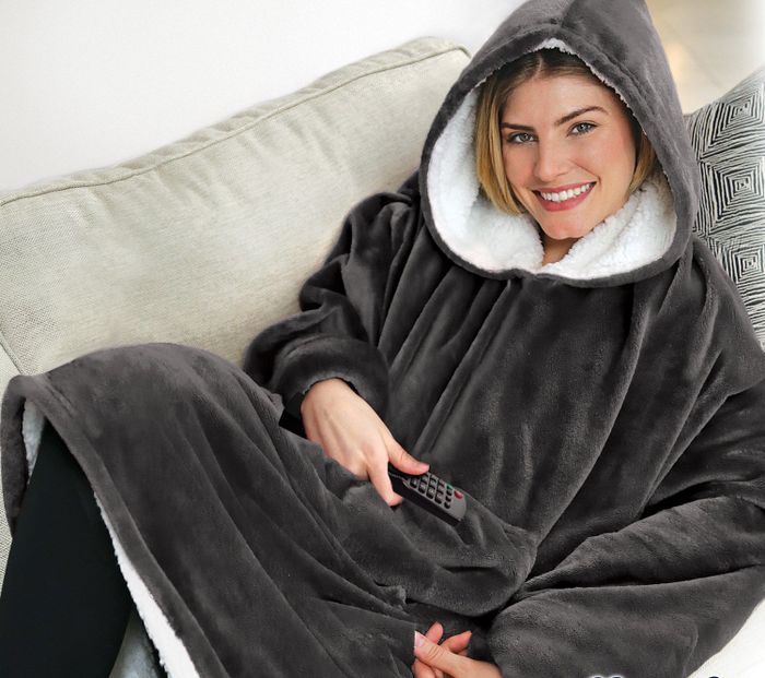 person wearing a gray huggle hoodie