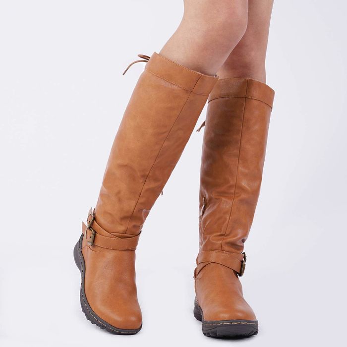 The brown knee-high boots with two ankle buckles and black soles.