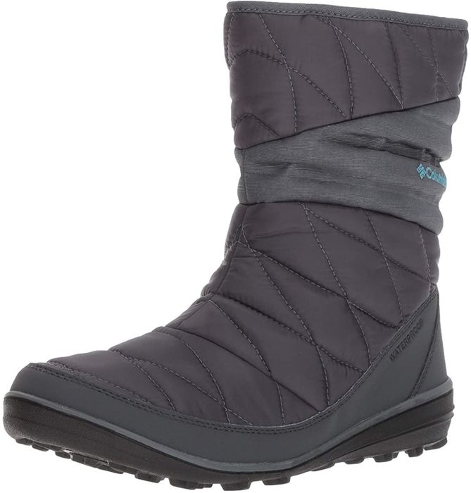 A dark grey quilted boot with a black sole.
