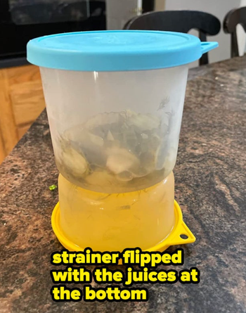 The container flipped, causing the juice to pool at the bottom.