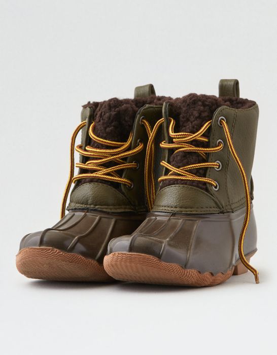 Duck boots in a combination of brown and olive green, complete with vibrant yellow laces for a touch of color and style.