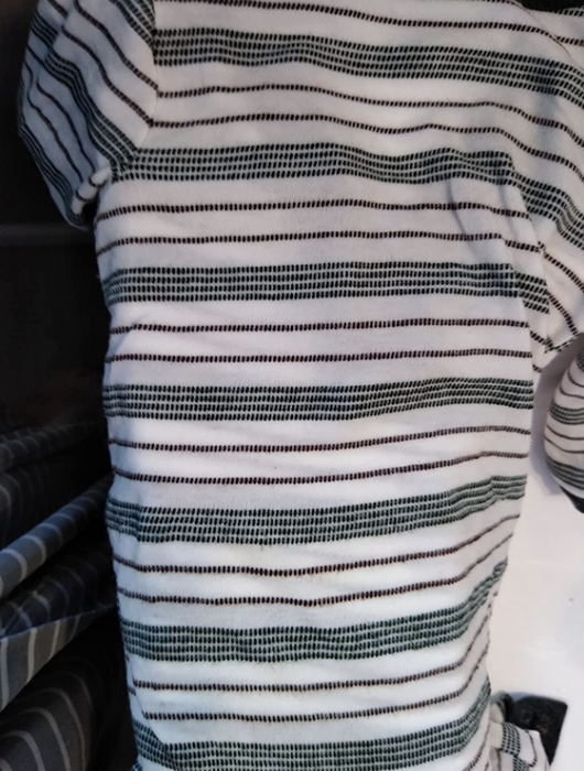 The same shirt looking spotless without the stain